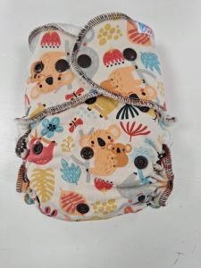 Koala Fluffy Organic Maxi/Night van Petit Lulu, drukknoopjes